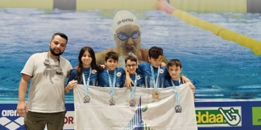 kartepe-belediyespor-yuzme-takimindan-tarihi-zafer.jpg